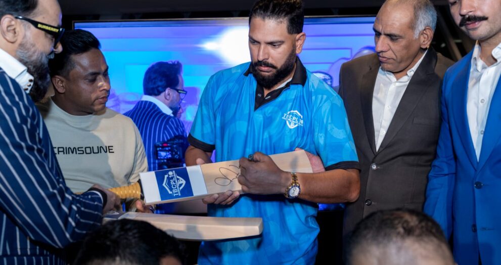 Yuvraj Singh signs a bat to launch the inaugural Tennis Ball Cricket Premier League 10 (TBCPL) at the kickoff event in Dubai on Monday, Jan 6 with promoter Naresh Pawar and key stakeholder Mohit Joon looking on.