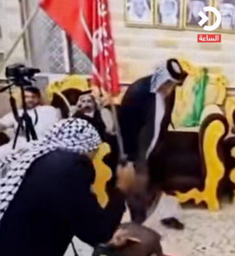 Iraqi Leader's Shocking Gesture of Loyalty at Rally