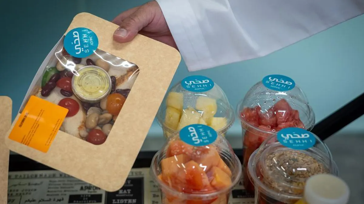 Healthy food options in a workplace cafeteria promoting nutrition.