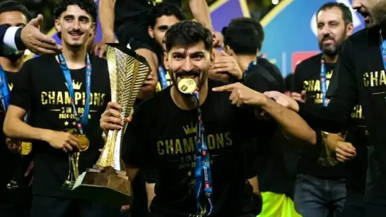 Fans celebrating Al-Hussein Irbid's third consecutive league title victory.