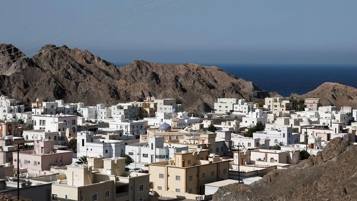 Scenic view of Al Jabal Al Akhdhar showcasing terraced farms and mountains.