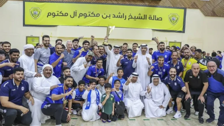 Al Nasr players celebrating after winning the National Handball Cup.