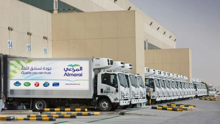 Almarai's production facility showcasing employees in the food and beverage industry.