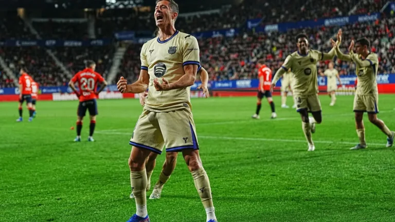Robert Lewandowski celebrating after scoring for Barcelona against Osasuna.