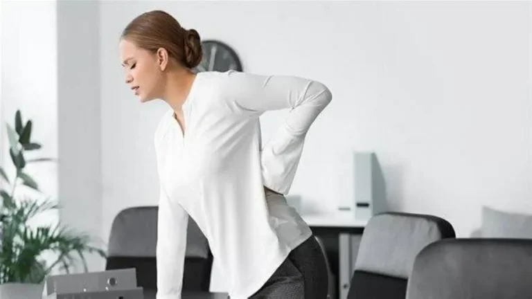A woman in her thirties considering dietary supplements for health.