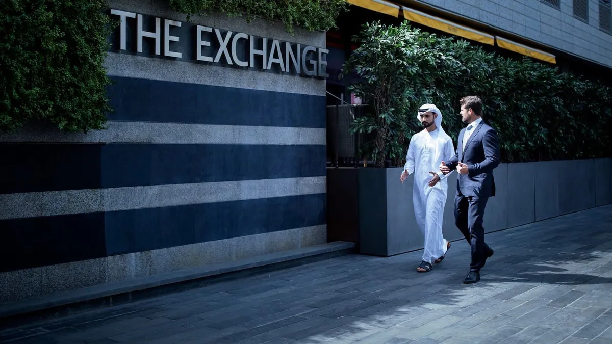 Stock market trading floor in Dubai showing financial activity.