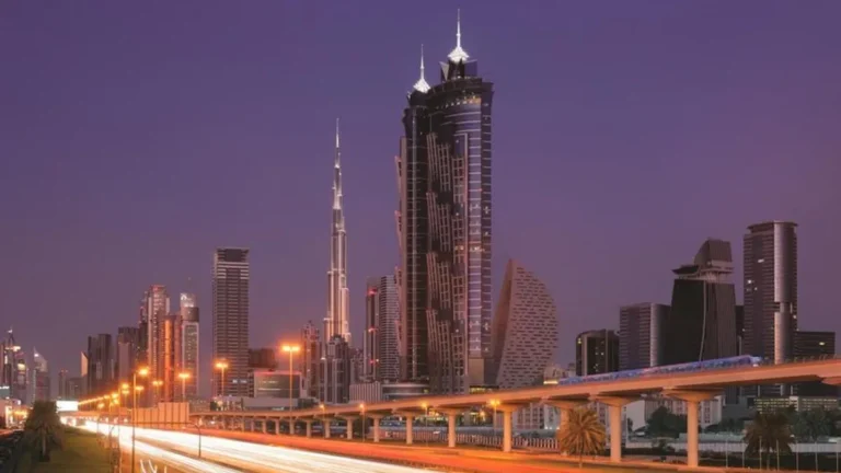 A bustling hotel lobby in Dubai showcasing recovering tourism activity.