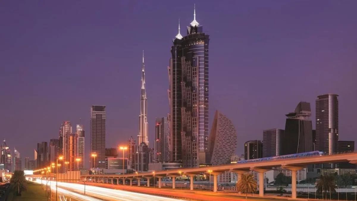 A bustling hotel lobby in Dubai showcasing recovering tourism activity.