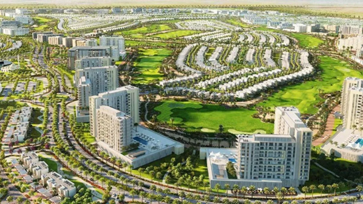 Aerial view of Dubai South showcasing residential developments and infrastructure projects.