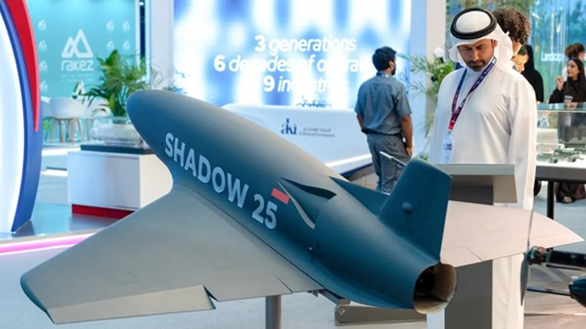 A bustling exhibition showcasing various industrial sectors at Emirates Manufacturing 2026.