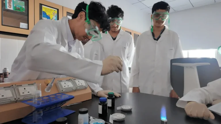 Students engaging in academic activities at Emirates National Schools.