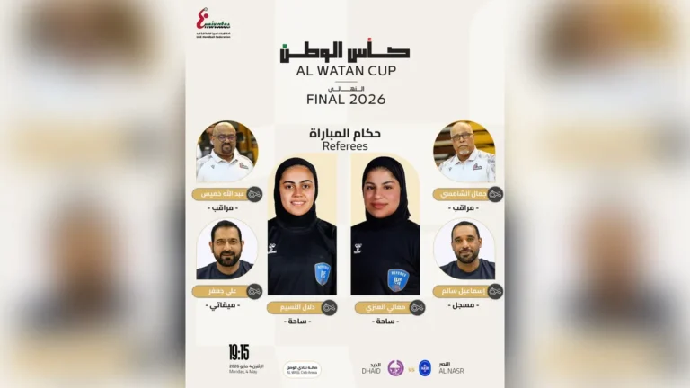 Female referees officiating a handball match.