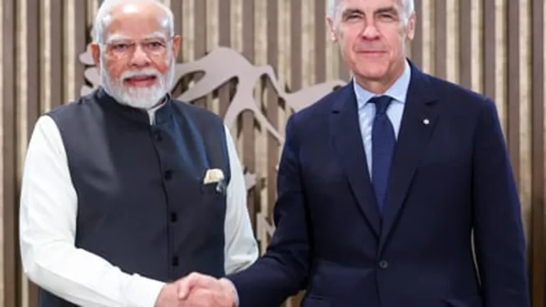 Indian and Canadian flags symbolizing economic partnership discussions.