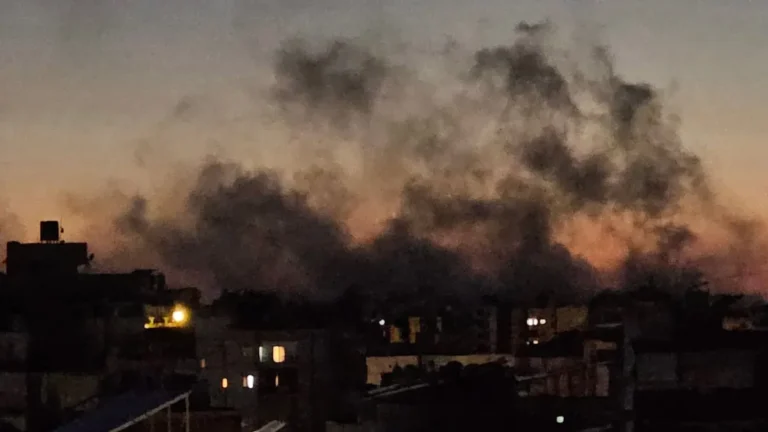 Smoke rises from an explosion in Beirut's southern suburbs following Israeli airstrikes.