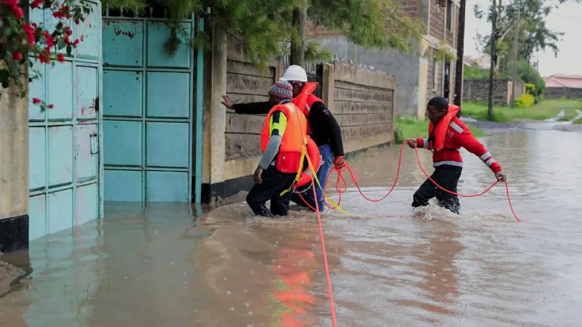 Rescue workers assess the damage from flooding and landslides in Kenya.