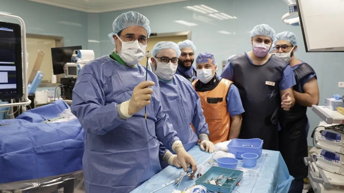 Doctors performing a cardiac procedure at LAU Medical Center using advanced technology.