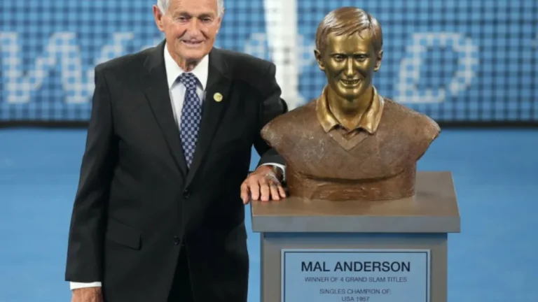 Mal Anderson holding the US Open trophy during his victorious 1957 campaign.