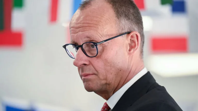 German Chancellor Friedrich Merz addresses a conference in Berlin.