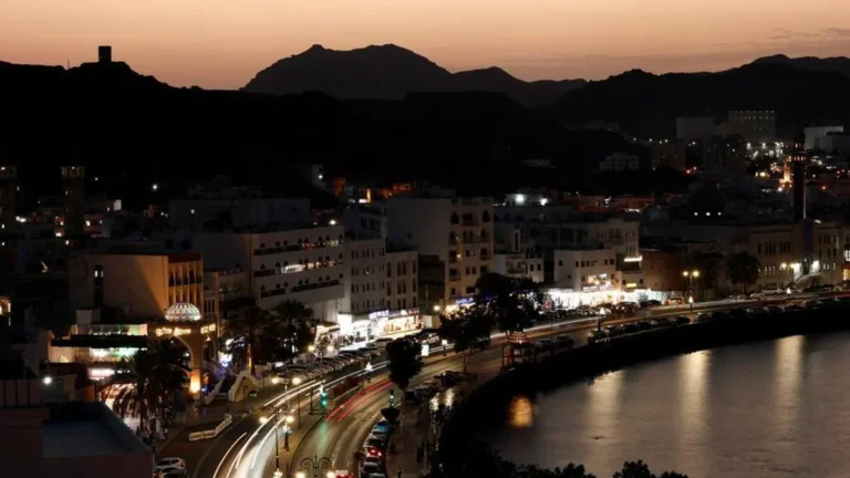 Oman transport officials discussing new land transport initiatives.