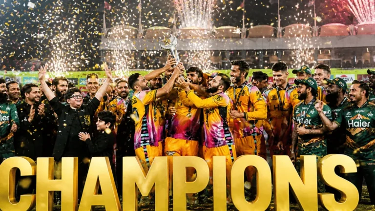 Peshawar Zalmi players celebrating their PSL 11 victory at Gaddafi Stadium.