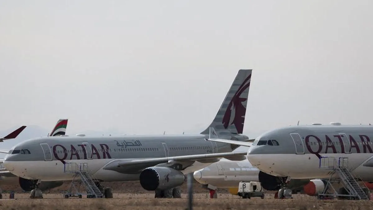 Qatar Airways aircraft at an airport, symbolizing expanded flight services.