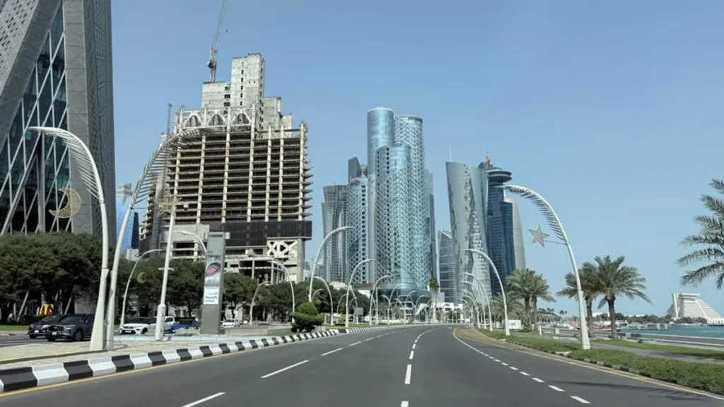 Sunny weather in Doha with clear skies and distant hazy horizon.