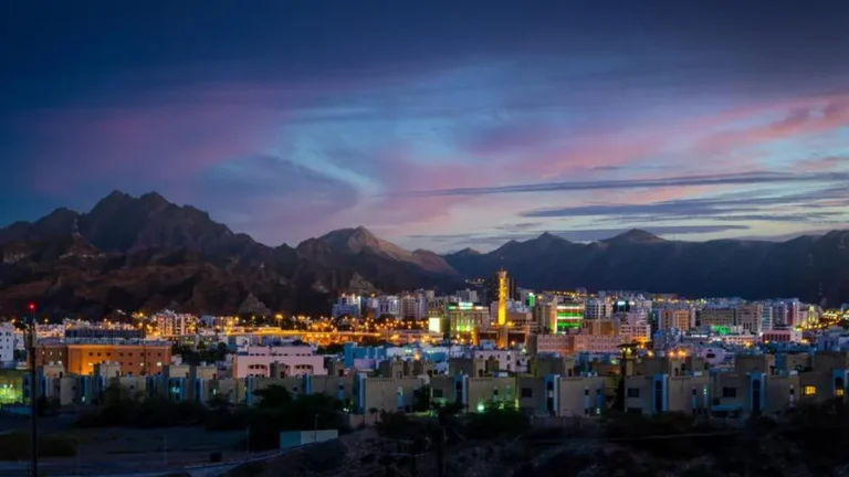 Visitors enjoying the vibrant mango season in Qurayat, Oman.