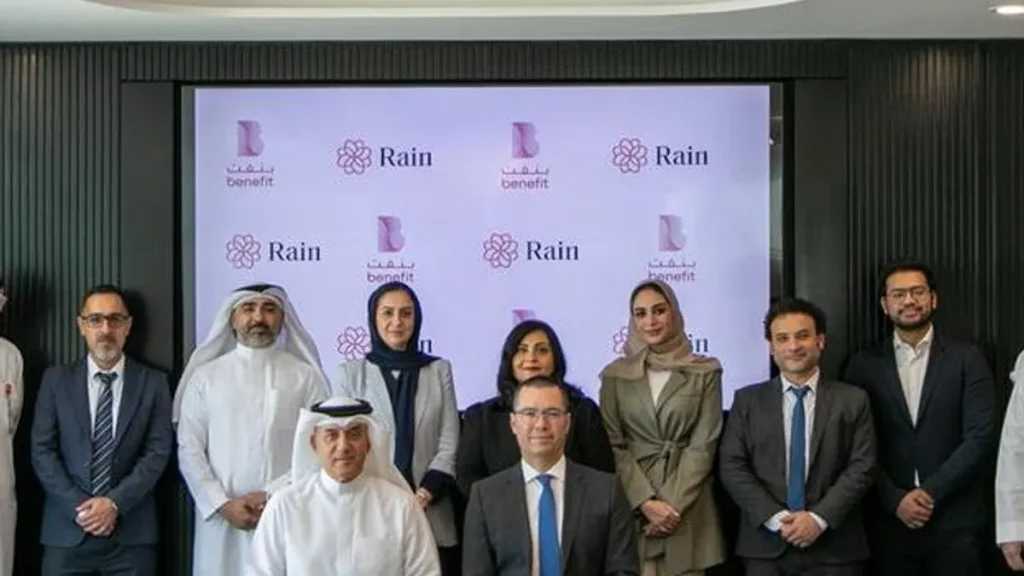 Rain Bahrain and Benefit logos symbolizing their partnership in crypto payments.