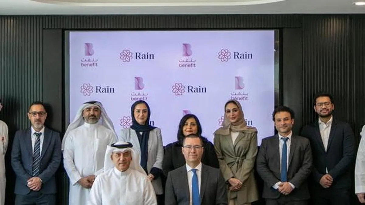 Rain Bahrain and Benefit logos symbolizing their partnership in crypto payments.