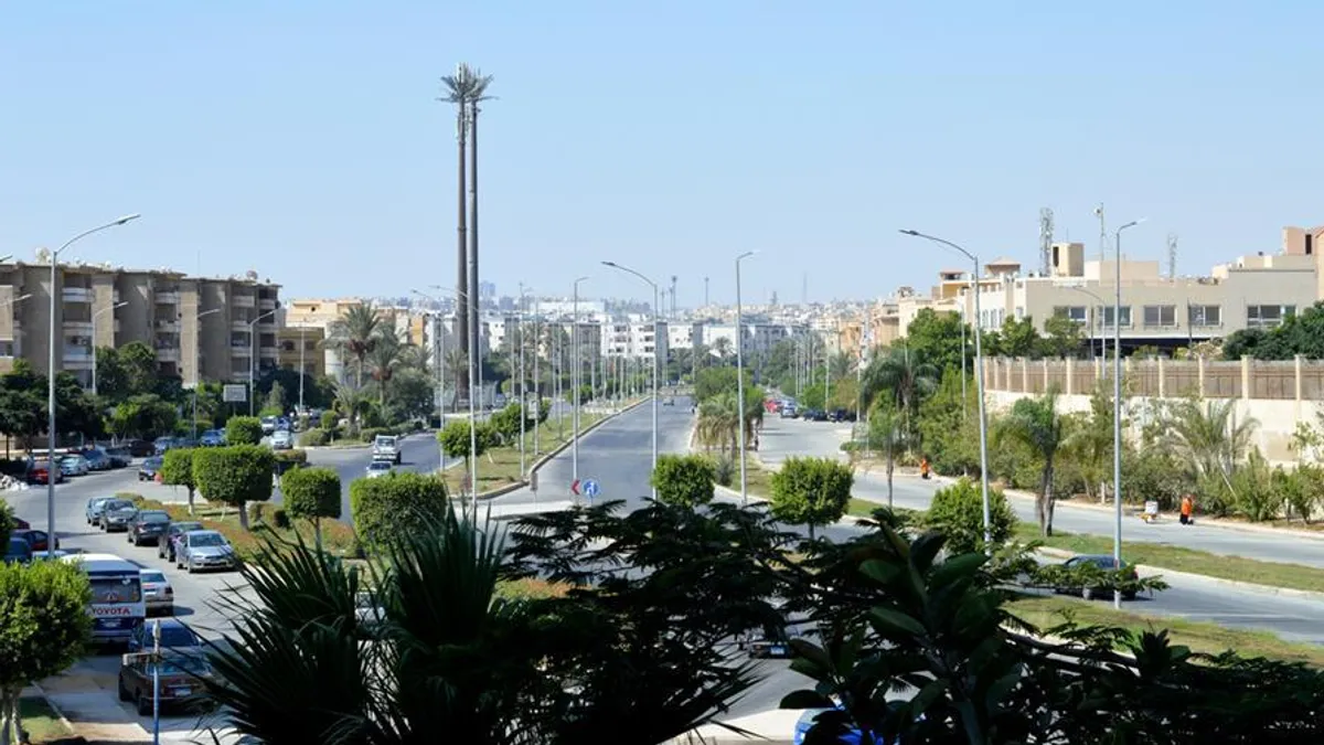 View of modern streets in Giza Sheikh Zayed city, showcasing urban life.