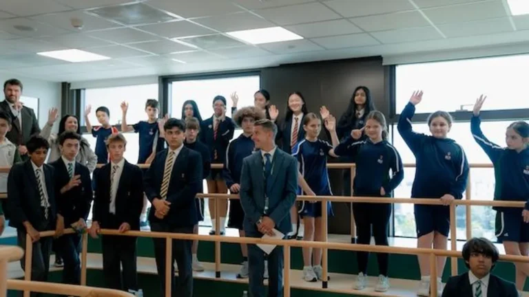 Students engaging in discussions and presentations at Royal Grammar School Guildford Dubai.