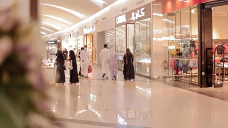 Saudi Arabia's consumer spending growth illustrated with shopping and transaction visuals.