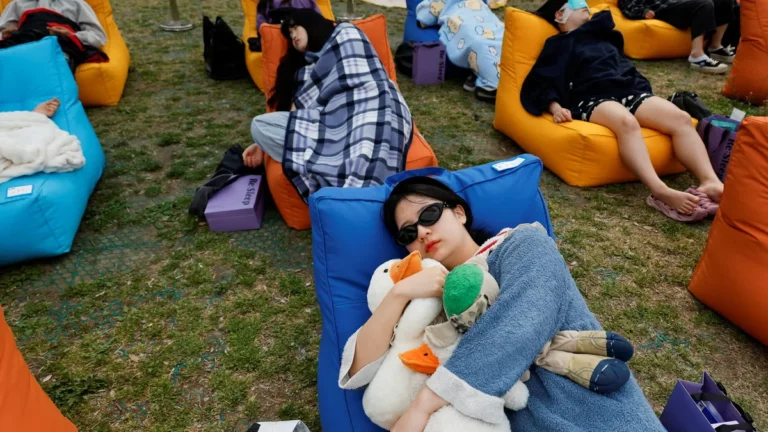 Participants in colorful sleep attire at the Seoul nap competition.