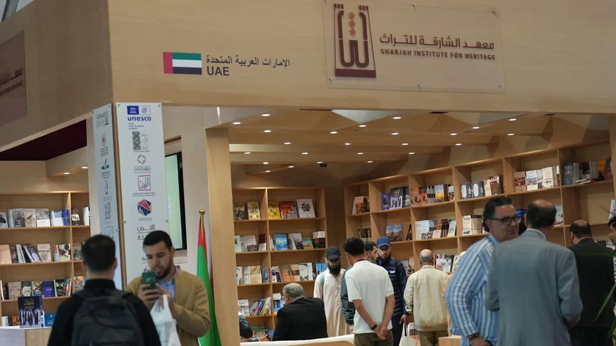 Visitors engaging with books and cultural exhibits at the Rabat International Book Fair.