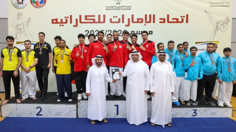 Sharjah Karate Club team celebrating their victory in the national league.