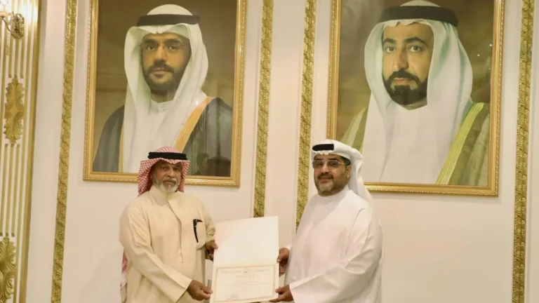 Yusuf Al-Basri receiving an award from Sharjah Municipality for his bravery.
