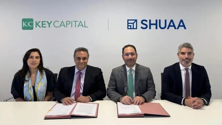 SHUAA Capital and Key Capital executives discussing the new investment partnership.