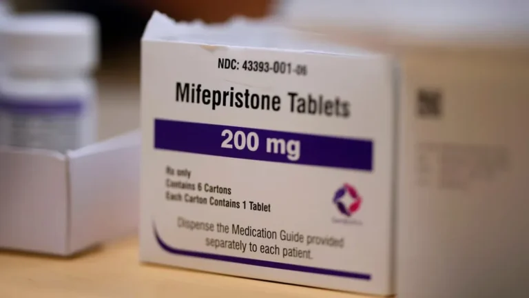 A pharmacy counter with mifepristone medication on display.