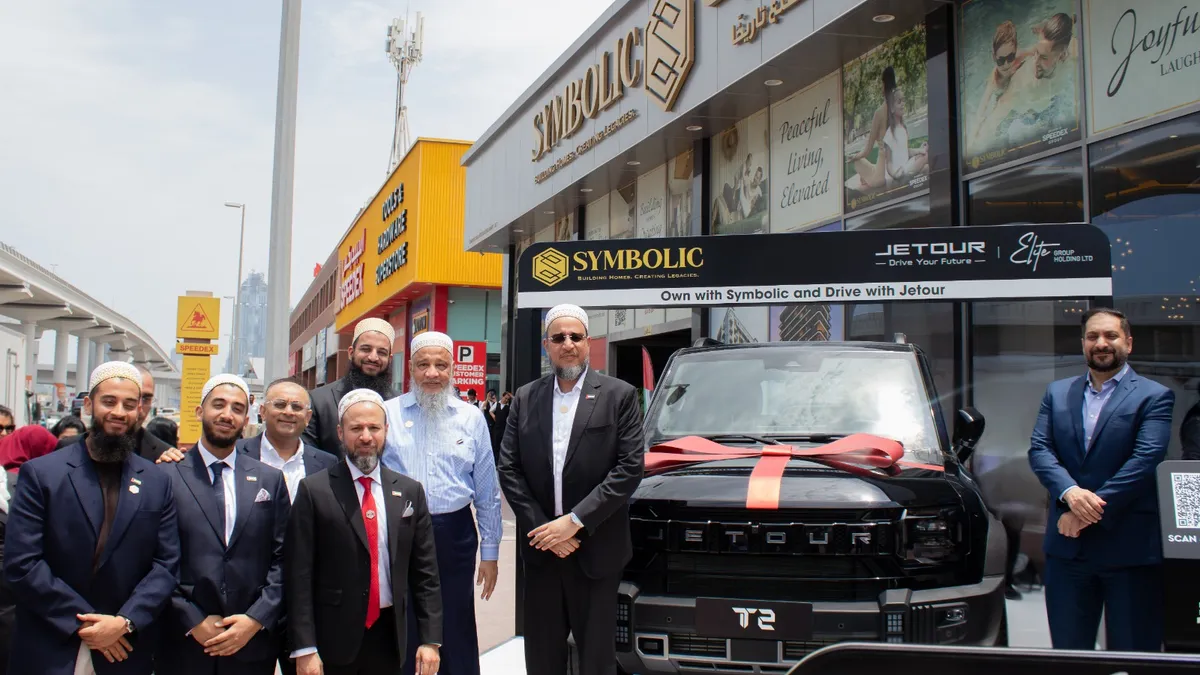 Jetour T2 SUV parked in front of Symbolic Zen Residences in Dubai.