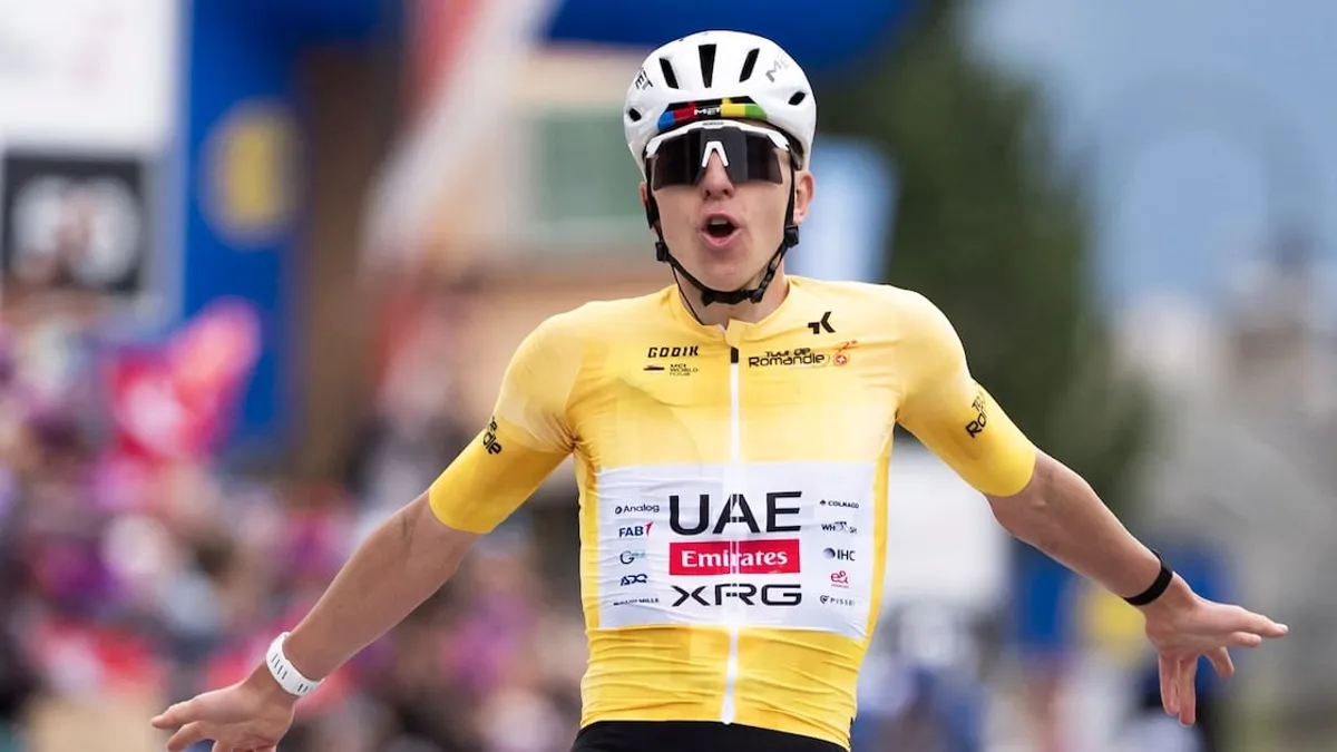 Tadej Pogacar celebrating victory at the Tour de Romandie.