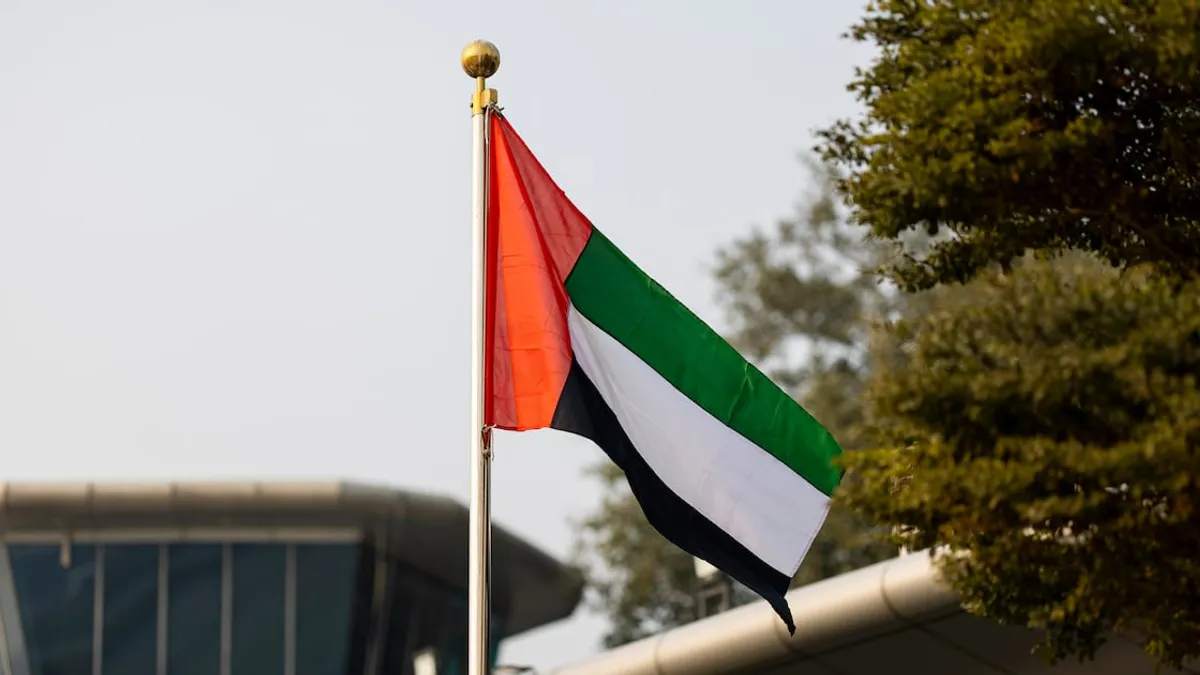 UAE air defense systems intercepting missiles over territorial waters.