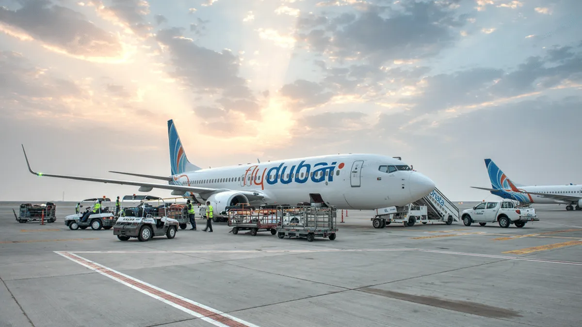 Dubai International Airport bustling with travelers after resumption of full aviation operations.