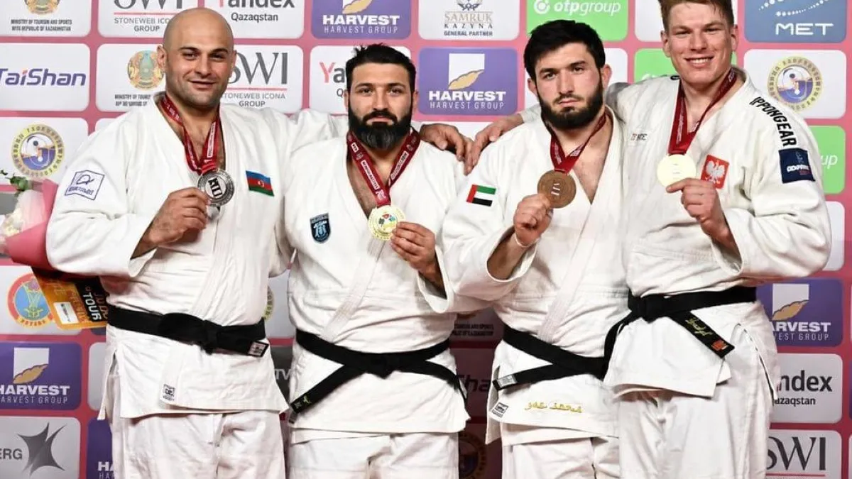 UAE judo team celebrating their achievements at the Astana Grand Slam.