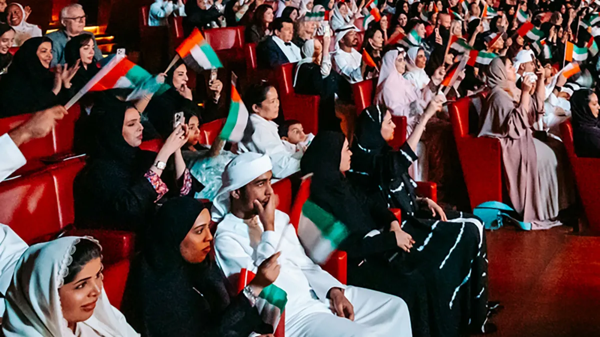 Audience enjoying a performance by the UAE National Orchestra at Dubai Opera.