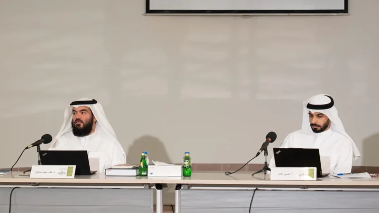 Discussion on prayer times determination at Al Muntada Al Islami headquarters.