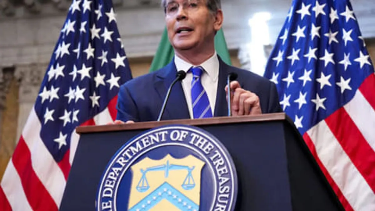 US Treasury Chief discussing Iran blockade impacts during a press conference.