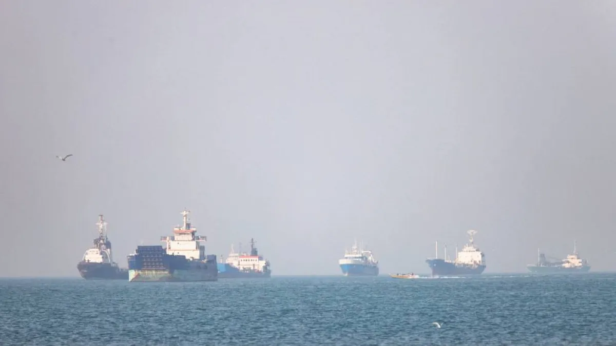 U.S. Navy ships patrolling the Strait of Hormuz amid rising tensions.