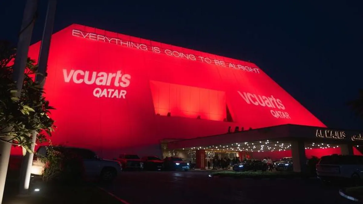 Graduates at the VCUarts Qatar Commencement ceremony celebrating their achievements.
