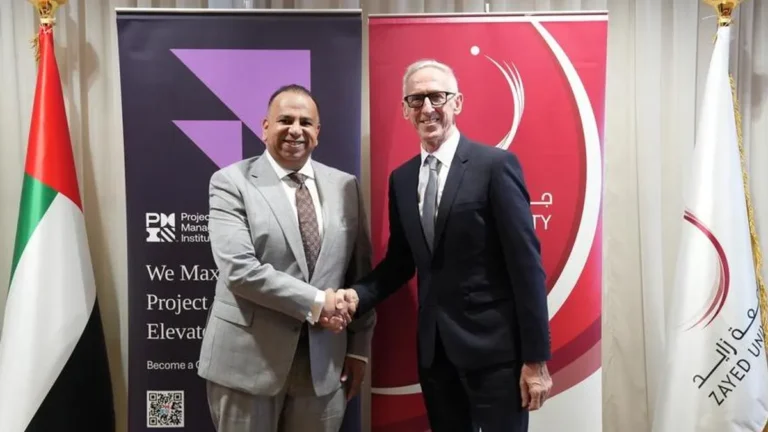 Zayed University and PMI executives signing the Memorandum of Understanding.